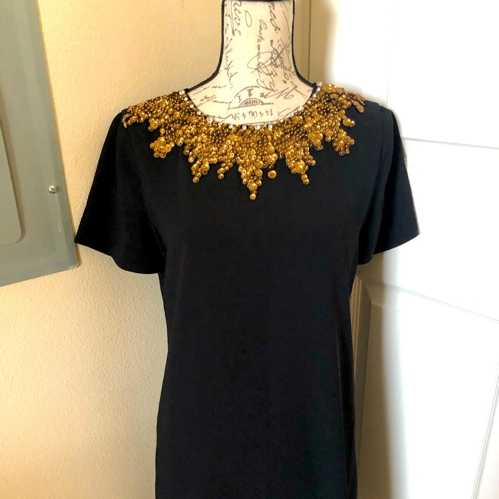 Pretty black dress with gold sequins and beads.